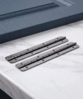 Two Pack Stainless Steel Piano Hinges 5 Inch By 0.7 Inch Heavy Duty Continuous Hinges With Holes on marble surface