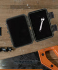 Dang Tough Portable Waterproof Plastic Toolbox With Rugged Latches For Nails Screws And Small Parts, open with wrench inside.