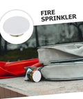 Concealed Fire Sprinkler Cover Plate And Ceiling Escutcheon featuring a snug fit, white finish, on a fire hose setup.