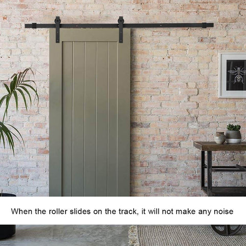 Heavy Duty Dual Deck Sliding Barn Door Kit With Silent Rollers And Track System installed on brick wall interior