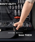 Person holding the Rugged 72 By 24 Inch EVA Rubber Workbench Mat 5mm Thick Heavy Duty Top Protector For Garage And Workshop Tables Tool Station Rolling Carts Durable Non Slip Liner For Work Surface, demonstrating thickness next to a tool set.