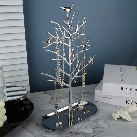 Dope Tree Tower Jewelry Rack With Metal Tray on countertop displaying rings and necklaces, luxury organizer for living room