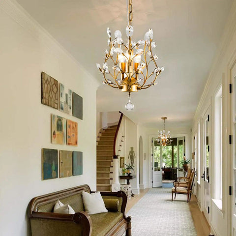 Three Light K9 Crystal Pendant Chandelier In Gold, in living room with modern decor, 39 inch adjustable cord