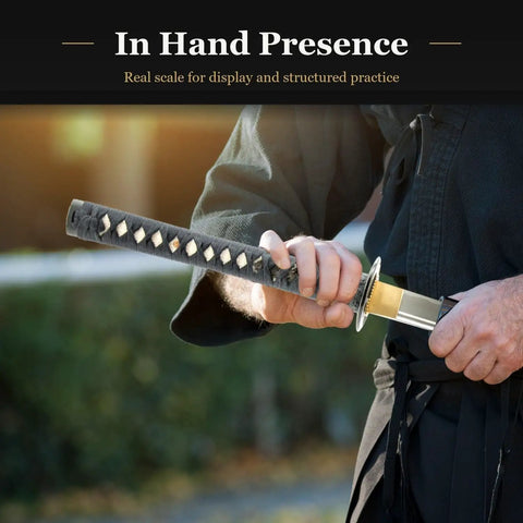 Practitioner holding Wakizashi Iaito Unsharpened Aluminum Alloy Practice Sword For Iaido Training, 21 Inch Blade With Bo Hi