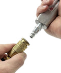 Connecting a Six Ball Brass Female Industrial Coupler 1/4 Inch With Nitrile Seals to an air tool, showcasing corrosion resistance