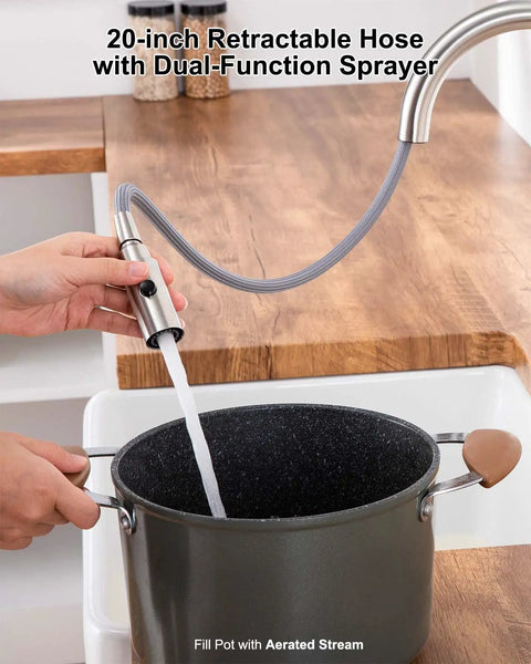 High Arc Kitchen Faucet With Pull Down Sprayer and Magnetic Docking Brushed Nickel Finish filling pot in sink with spray