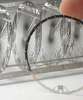 Detail of Hindenburg LZ129 1 to 1000 Scale Photo Etched Stainless Steel Model Kit pieces and assembly components for enthusiasts.