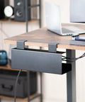 No Drill Clamp On 17 Inch Power Strip Tray for under-desk cable management, heavy-duty steel, black, installed on wooden desk