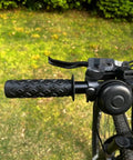 Non Slip Seven Eighths Inch Bike Handlebar Grips Soft TPR Rubber Upgrade End Grips for Mountain Bikes shown on handlebar.