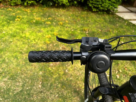 Non Slip Seven Eighths Inch Bike Handlebar Grips Soft TPR Rubber Upgrade End Grips for Mountain Bikes shown on handlebar.