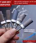 20Pcs 320 Grit Sanding Drums And Sandpaper Sticks Set For Rotary Tools in hand, showing both wet and dry usage options.