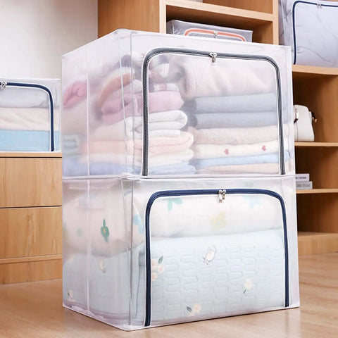 Stacked Huge 80L Foldable Storage Bins Organizer With Metal Frame And Durable Handles Clear And Gray 3 Pack in bedroom