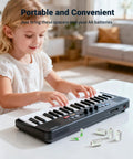 Child plays keyboard, C Size Battery Adapters AA To C Converter Spacer Case 4 Pack For Rechargeable AA Cells nearby.