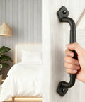 12 Inch Rustic Barn Door Handles Easy Install Heavy Duty Barn Door Pull For DIY Sliding Doors Gates Sheds And Garages Round Solid Metal Construction In Matte Black Finish Includes Mounting Hardware For Quick Installation And Rust Resistant Finish showing installed view on bedroom door