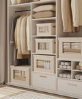 Large Fabric Storage Bins With Lids And Handles 17.7 By 11.8 By 11.8 Inches Clear Front Window See Through Linen Closet Organizer Boxes Light Gray 5 Pack Durable Odorless Material arranged in a closet with visible clothing and textiles.