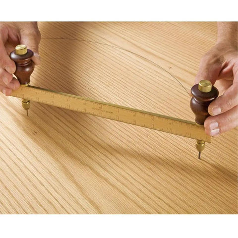 Heavy Duty Adjustable Trammel Points Set With Smooth Hardwood Handles And Precision Pencil Leads For Knockout Circle Layouts And No Hassle Arc Marking That Fits Dead Square On Shop Beams, demonstrating circle marking on wood.
