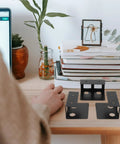 Rock Solid Under Desk Laptop And Keyboard Mount Bracket With Grippy Protective Pads And No Hassle Assembly For A Sharp Boss Desk Setup Total Game Changer Remote Workspace Organizer In Black on a stylish desk.