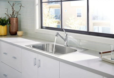 One-Handle Pullout Kitchen Faucet With Power Clean Spray Tech, Modern Chrome Finish, installed in a sleek contemporary kitchen.