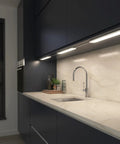 Under cabinet kitchen counter with RGB under cabinet lighting kit with motion sensor, 3 ultra thin panels, plug in lights in use.