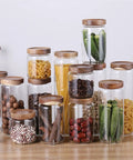 Straight Up Solid Airtight Coffee And Tea Storage Canister With Smooth Wood Lid, various sizes holding coffee, grains, and veggies.