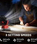 Man working in workshop beside a Cordless 5 Inch Jobsite Fan For Milwaukee 18V Battery, Brushless Motor, LED Indicator, Variable Speed, USB Fast Charging, Your Go To Cooling Buddy For Camping, Workshop, And DIY Projects, Battery Not Included.