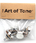 Four Bourns 500K short split-shaft audio-taper potentiometers; metal bodies in plastic bag with The Art of Tone card