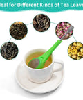 Long Handled Tea Infuser With Fine Mesh Strainer And Built In Plunger Reusable Loose Leaf Coffee Filter in green, steeping different teas.