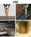HSS stepped drill bit set, titanium-coated, 3-pack with 1/4 in hex shank for sheet metal
Side view of titanium-coated HSS stepped drill bit cutting into metal sheet
Installed in a handheld drill near a car dashboard, demonstrating use
Close-up of gold stepped drill bit with multiple steps and conical tip