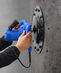 Powerful 1680W Electric Concrete Polishing Machine With Extension Rod and 90 Degree Trowel Head Three Handle Design in use on wall