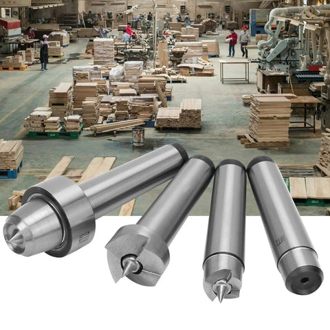 Essential 4 Piece Wood Turning Center Set With Spur And Cup Tool For Lathe Spindle Work showing steel tools in workshop.