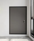 Heavy Gauge Rust Resistant Aluminum Drywall Access Panel With Secure Lock And Smooth Flush Mount Design For Hassle Free Wall Updates In Matte Black Finish viewed on a wall.