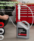 Heavy Duty 30cc Hand Oil Transfer Pump for Quick Transmission Fluid and Gear Oil in use with hose and gallon container.