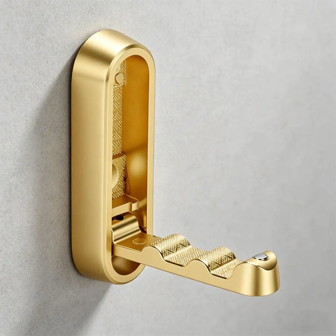 Space Saving Folding Wall Coat Hooks With Screws Pretty Sleek Copper Finish Heavy Duty Concealed Design mounted on wall.