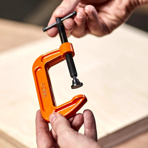2-1/2 Inch C Clamp Heavy Duty For Woodworking And DIY Projects, 600 Pound Load Capacity, 2 Inch Opening, orange clamp in hand