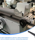 Clamping lever handle, black oxide, mounted on an industrial lathe for securing components.