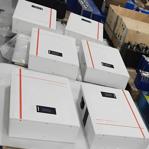 No Fuss Plug And Go 10Kwh Lifepo4 Solar Battery Smart Touch Display 51.2V 200Ah wall mounted units in a warehouse setting.