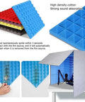 High density sound dampening foam panels in blue, red, black, and yellow for Sick Desk Side Vocal Booth For Clean Recordings And Podcasting Without The Room Bounce.
