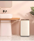 No Sweat Portable Mini Washing Machine With Smart Led Touch Panel and One Click Operation, compact design next to a sink.