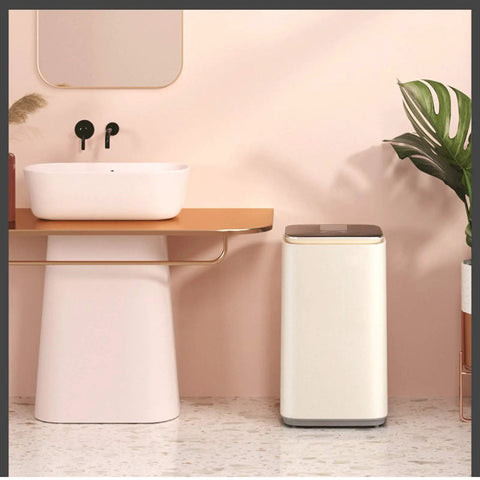 No Sweat Portable Mini Washing Machine With Smart Led Touch Panel and One Click Operation, compact design next to a sink.