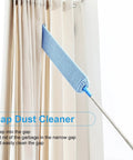 Retractable Gap Duster With Microfiber Dusting Cloths cleaning between curtain folds, washable and reusable, perfect for narrow spaces.