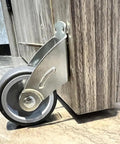 Heavy Duty Adjustable Door Bottom Support Wheel Stops Cabinet Sagging with steel and rubber roller, showing smooth glide under cabinet.