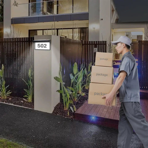 Front yard at night with Solar Powered Address Sign With LED Illumination Auto Dusk To Dawn Sensor Weatherproof Outdoor Metal Plaque