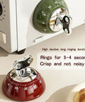 Red and green 60 Minute Magnetic Timer For Fridge Magnet And Kitchen Use on microwave, highlighting noiseless ring feature.