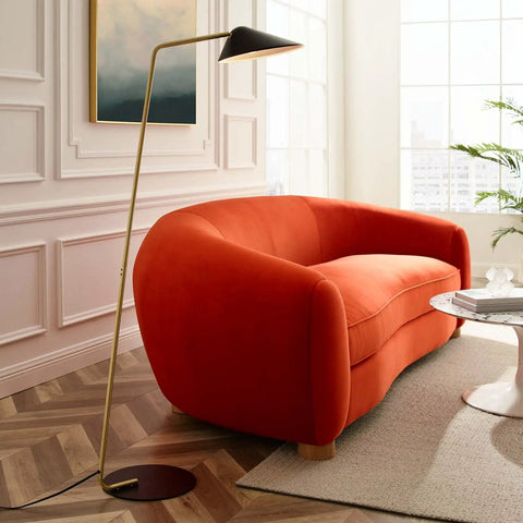 Cool Satin Brass Standing Floor Lamp With Sleek Modern Design, LED Compatible, near orange sofa, warm ambient light in living room