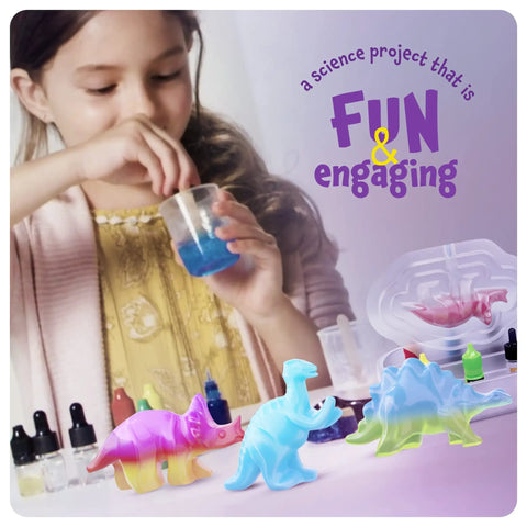 Kids Dinosaur Soap Making Kit For Fun DIY Bath Time Crafts Include Colorful T Rex Stegosaurus And Styracosaurus Soaps Learn Science While You Soak Playful Bath Toy Set girl mixing blue soap in mold