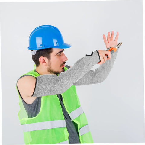 Man wearing Heavy Duty Cut Resistant Arm Sleeves With Thumb Hole Built Tough As Nails For Welding And Gardening, using scissors.