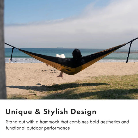 Person relaxing in Suparpine Camping Hammock With Straps Included Sand Color Single Size Lightweight Portable Gear For Backpacking Easy Setup Trip