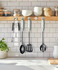 Kitchen wall with utensils hanging from six-pack 70 lbs neodymium round base cup magnets with countersunk holes.