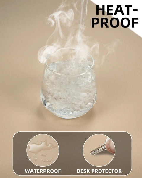 Glass of steaming water on Beige PU Leather Desk Pad Protector And Mouse Pad Large 31.5 By 15.7 Inch Non Slip Waterproof Desk Mat.
