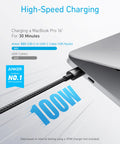 Anker USB-C to USB-C charging cable, 10 ft nylon-braided, 100W, black, connected to a MacBook Pro 16-inch